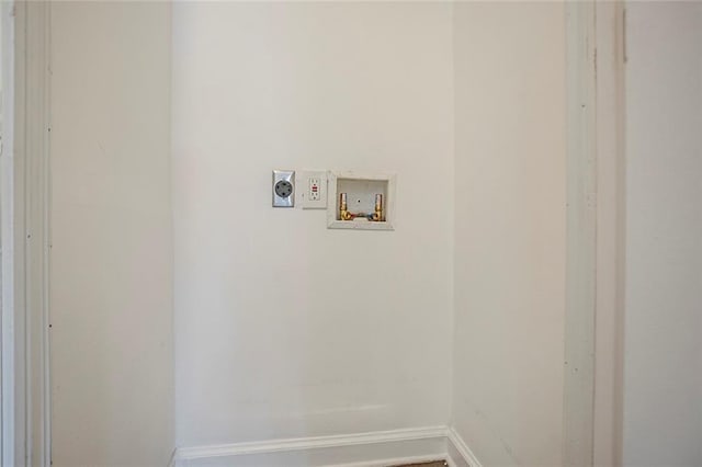 washroom featuring washer hookup, laundry area, baseboards, and electric dryer hookup