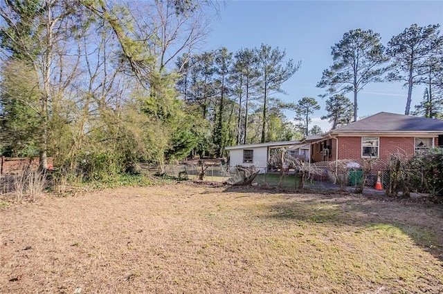 view of yard featuring fence