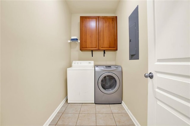 34 Laurel Way NE, White, GA 30184 - laundry area featuring cabinet space, washer and dryer, baseboards, electric panel, and light tile patterned flooring