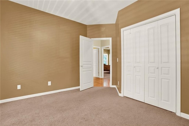 34 Laurel Way NE, White, GA 30184 - unfurnished bedroom with carpet flooring, baseboards, and a closet