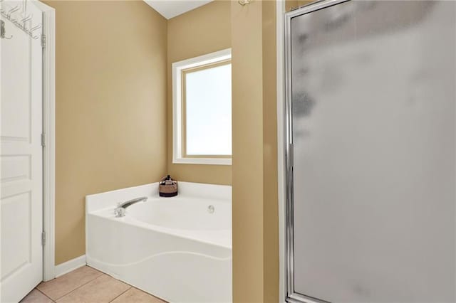 34 Laurel Way NE, White, GA 30184 - full bath featuring a shower stall, tile patterned flooring, a bath, and baseboards