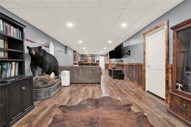 34 Laurel Way NE, White, GA 30184 - living area featuring wood-type flooring, a wainscoted wall, a paneled ceiling, and recessed lighting