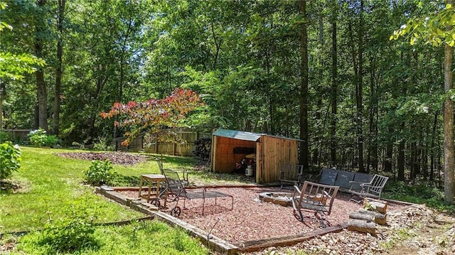 34 Laurel Way NE, White, GA 30184 - view of yard featuring a fire pit and a forest view