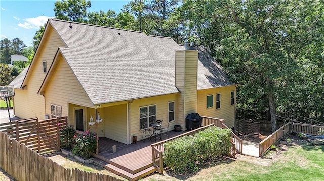 34 Laurel Way NE, White, GA 30184 - back of house with roof with shingles, a deck, and a chimney