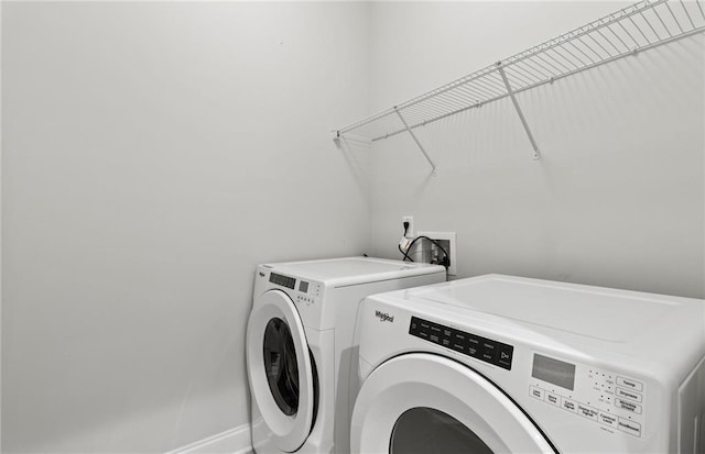 402 Beacon Way, Villa Rica, GA 30180 - laundry room with washer and clothes dryer and baseboards