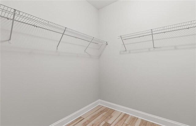 402 Beacon Way, Villa Rica, GA 30180 - spacious closet featuring light wood-type flooring