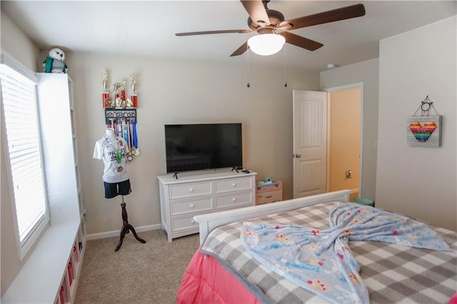 6892 Big Sky Dr, Flowery Branch, GA 30542 - bedroom with light carpet, baseboards, and ceiling fan
