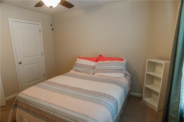 6892 Big Sky Dr, Flowery Branch, GA 30542 - carpeted bedroom with baseboards and a ceiling fan