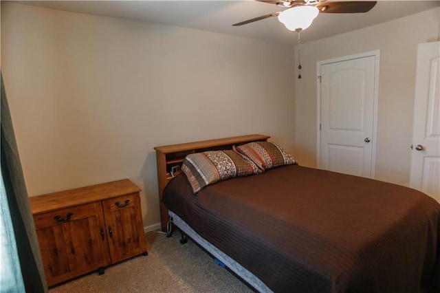 6892 Big Sky Dr, Flowery Branch, GA 30542 - bedroom with light carpet, a ceiling fan, and baseboards
