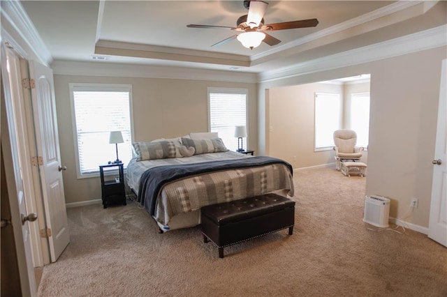 6892 Big Sky Dr, Flowery Branch, GA 30542 - bedroom featuring a raised ceiling, light colored carpet, multiple windows, and crown molding