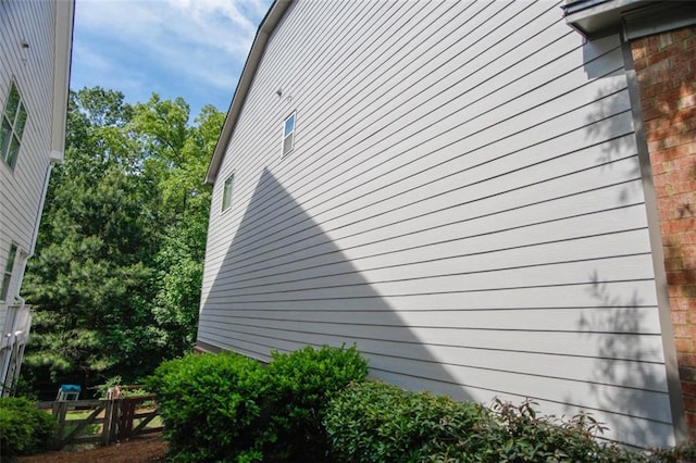 6892 Big Sky Dr, Flowery Branch, GA 30542 - view of side of property featuring fence