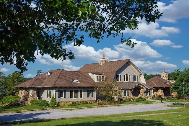 6892 Big Sky Dr, Flowery Branch, GA 30542 - view of front facade featuring a front lawn and a chimney