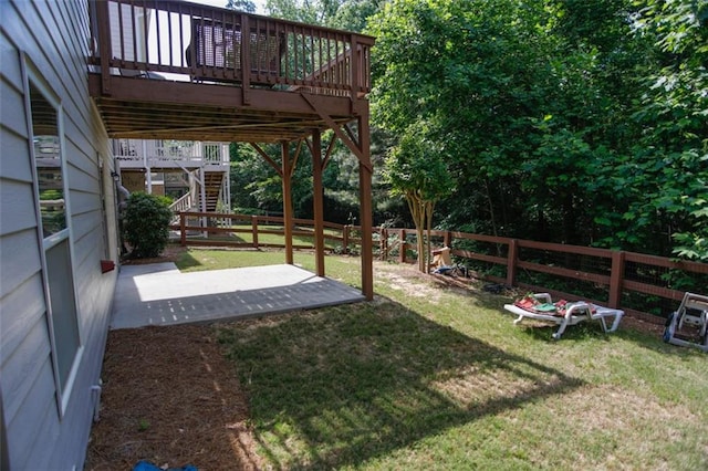 6892 Big Sky Dr, Flowery Branch, GA 30542 - view of yard with stairway, a wooden deck, and a patio