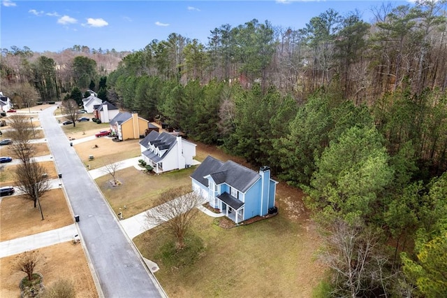 bird's eye view featuring a view of trees