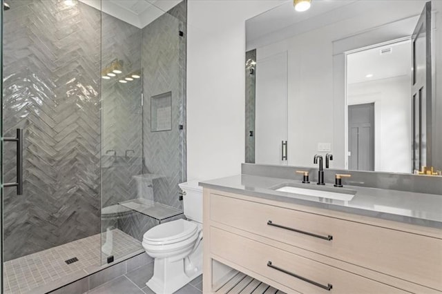 bathroom featuring tile patterned floors, toilet, vanity, and walk in shower