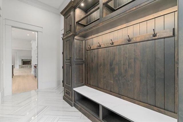 mudroom with ornamental molding