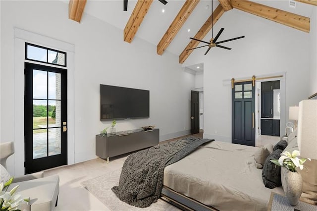 bedroom featuring beamed ceiling, a barn door, ensuite bathroom, and high vaulted ceiling