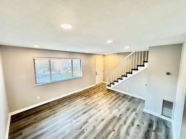 interior space with hardwood / wood-style flooring