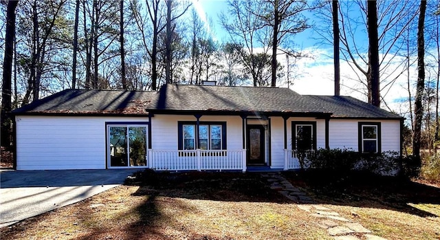 ranch-style house featuring covered porch