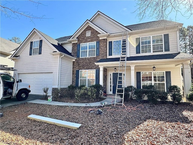 view of front of property featuring a garage