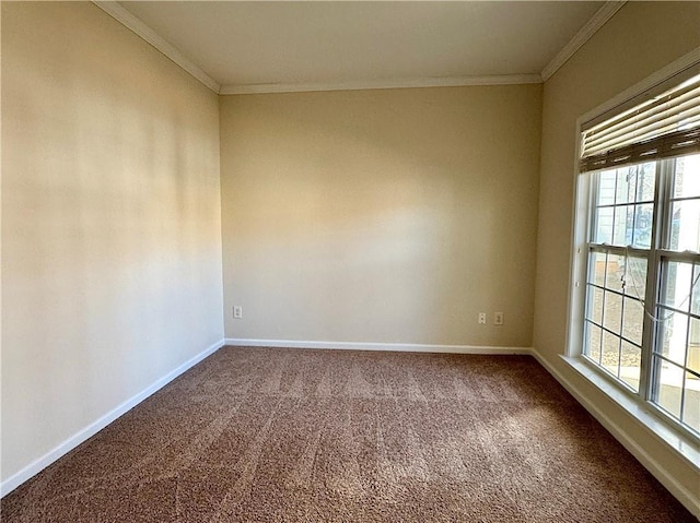 carpeted empty room featuring ornamental molding