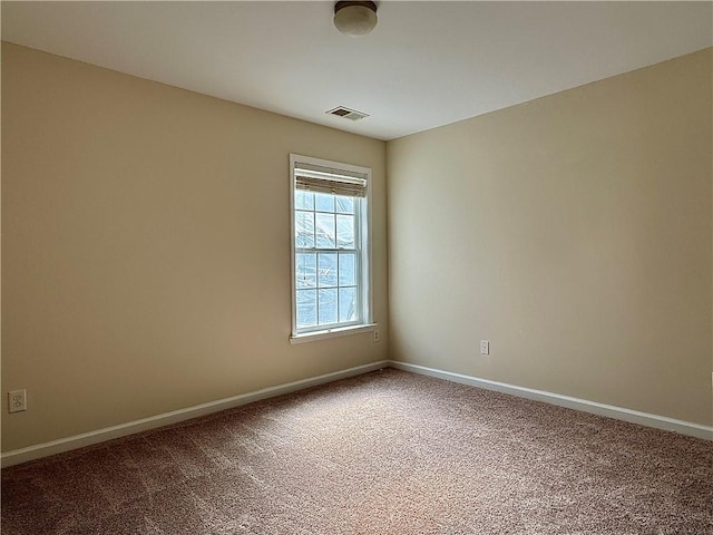 view of carpeted spare room