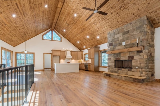 unfurnished living room featuring wood ceiling, a stone fireplace, light wood-style flooring, high vaulted ceiling, and a ceiling fan