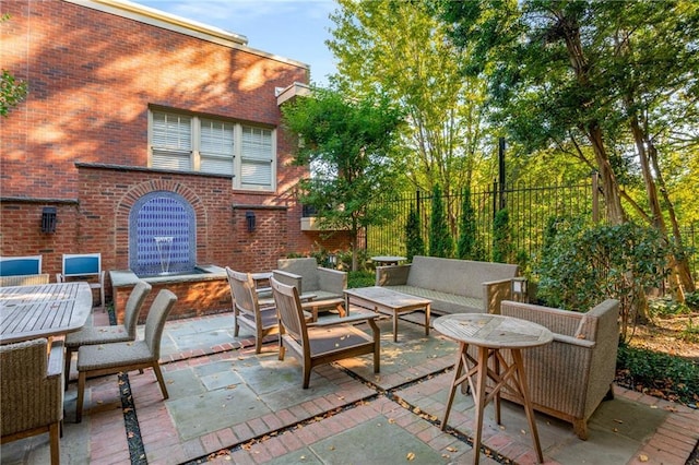 view of patio / terrace featuring outdoor dining space and outdoor lounge area