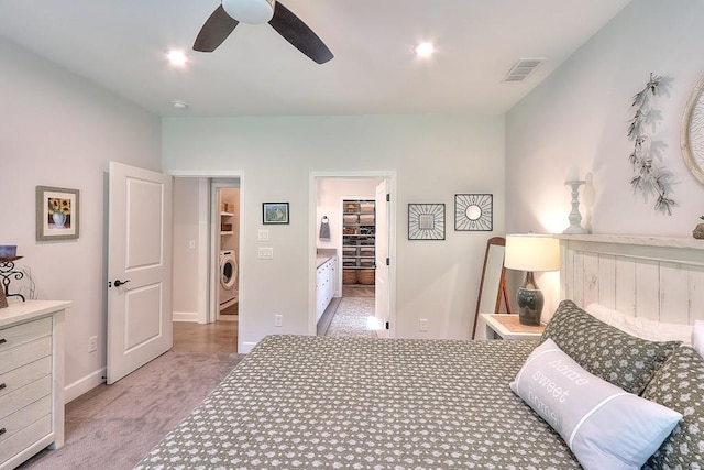 bedroom with recessed lighting, visible vents, a ceiling fan, carpet flooring, and washer / dryer