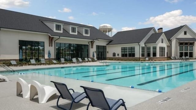 pool with a patio area