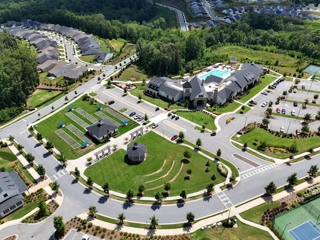 aerial view with a residential view and a view of trees