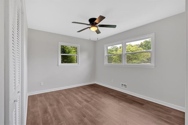 4477 Timber Ridge Dr, Douglasville, GA 30135 - unfurnished bedroom with wood finished floors, a closet, and a ceiling fan