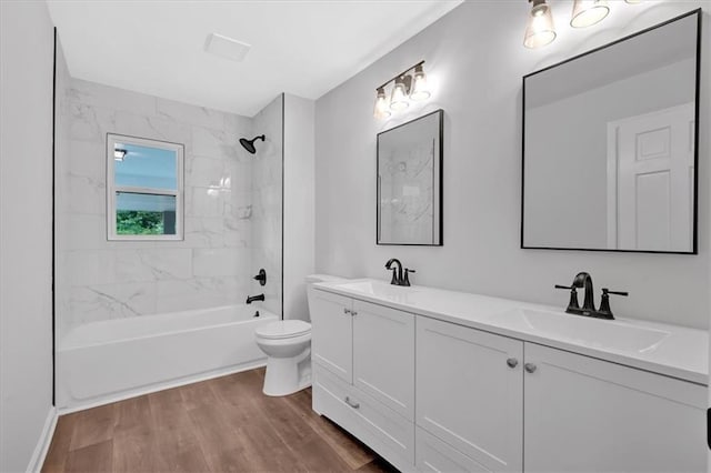 4477 Timber Ridge Dr, Douglasville, GA 30135 - full bathroom with double vanity,  shower combination, and wood finished floors