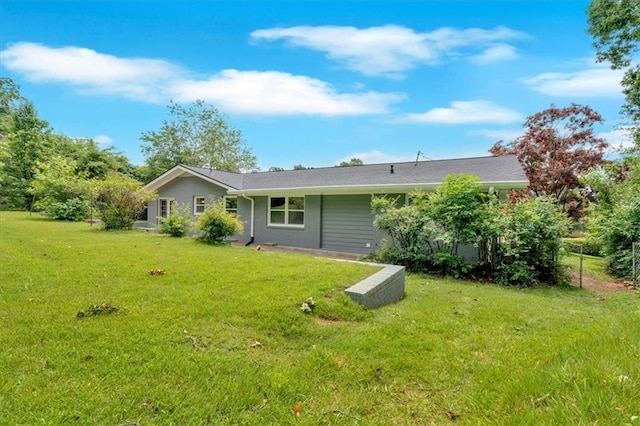 4477 Timber Ridge Dr, Douglasville, GA 30135 - rear view of house with a yard