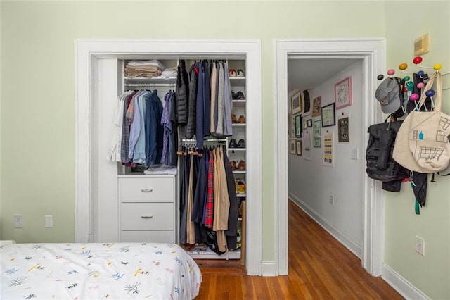 737 Barnett St NE Unit B6, Atlanta, GA 30306 - bedroom featuring a closet and wood finished floors