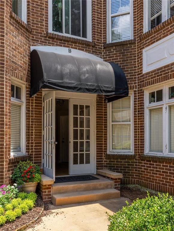 737 Barnett St NE Unit B6, Atlanta, GA 30306 - view of exterior entry with brick siding