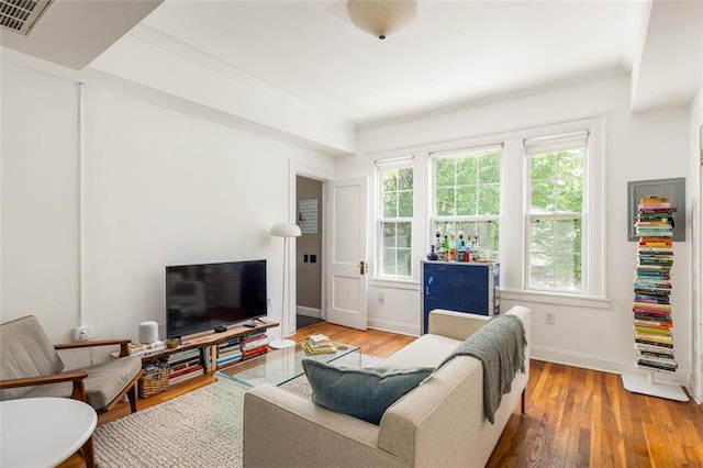 737 Barnett St NE Unit B6, Atlanta, GA 30306 - living room featuring hardwood / wood-style floors and crown molding