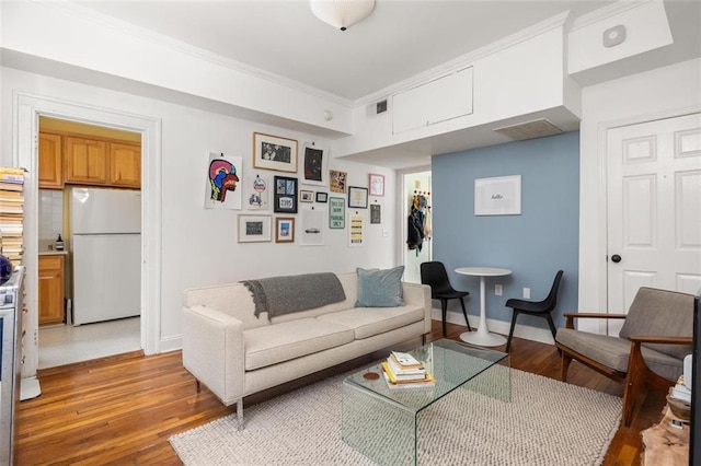 737 Barnett St NE Unit B6, Atlanta, GA 30306 - living area with wood finished floors and crown molding