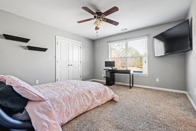 carpeted bedroom with ceiling fan