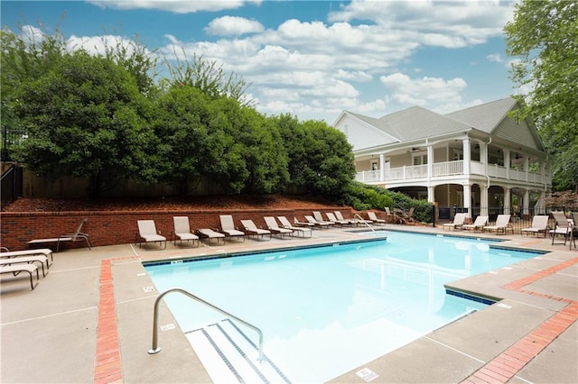 view of pool featuring a patio area