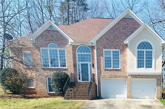 view of front of property with a garage