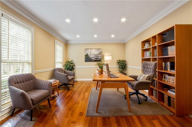 office space featuring hardwood / wood-style flooring and crown molding