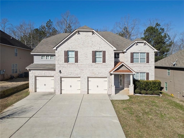 traditional-style house with brick siding, roof with shingles, concrete driveway, and an attached garage