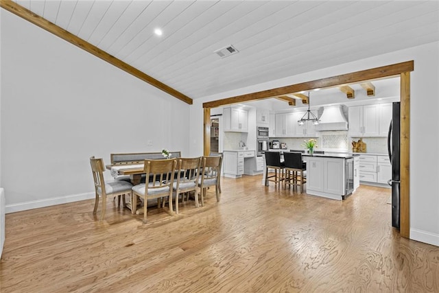 415 Southridge Rd, Winder, GA 30680 - dining space featuring light wood-style floors, wood ceiling, and recessed lighting