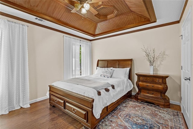 415 Southridge Rd, Winder, GA 30680 - bedroom featuring a raised ceiling, wood ceiling, dark wood-type flooring, crown molding, and ceiling fan