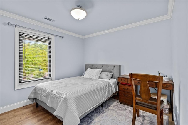 415 Southridge Rd, Winder, GA 30680 - bedroom featuring crown molding and wood finished floors