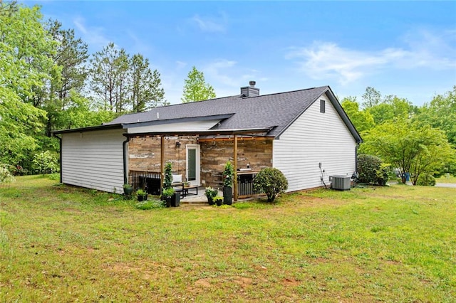 415 Southridge Rd, Winder, GA 30680 - rear view of property featuring a lawn, a chimney, and a patio area