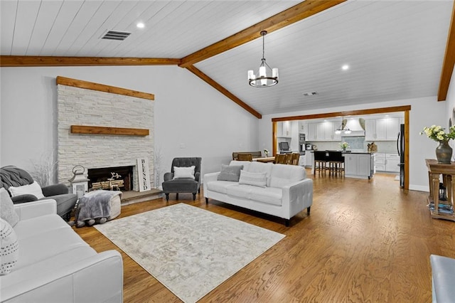415 Southridge Rd, Winder, GA 30680 - living room featuring wood finished floors, a chandelier, a fireplace, wood ceiling, and recessed lighting