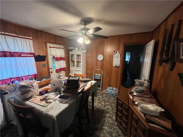 301 Sisson Ave NE, Atlanta, GA 30317 - dining room featuring wood walls and a ceiling fan