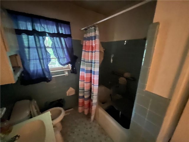 301 Sisson Ave NE, Atlanta, GA 30317 - bathroom featuring toilet and shower / bathtub combination with curtain